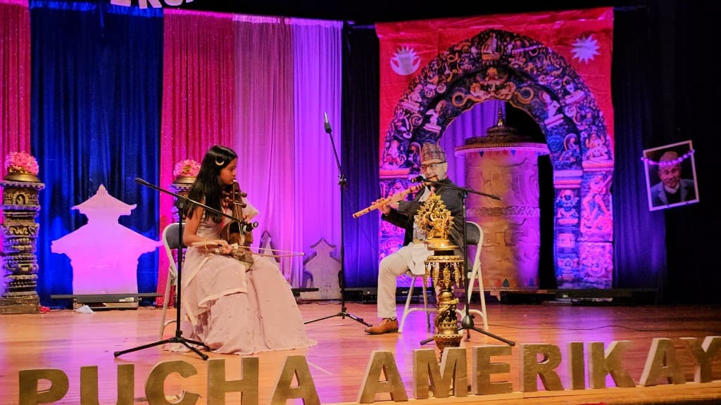 Cultural performance with traditional Nepali musicians on stage